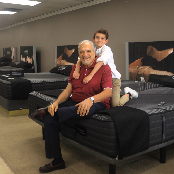 Popular Mattress family inside an El Paso mattress showroom